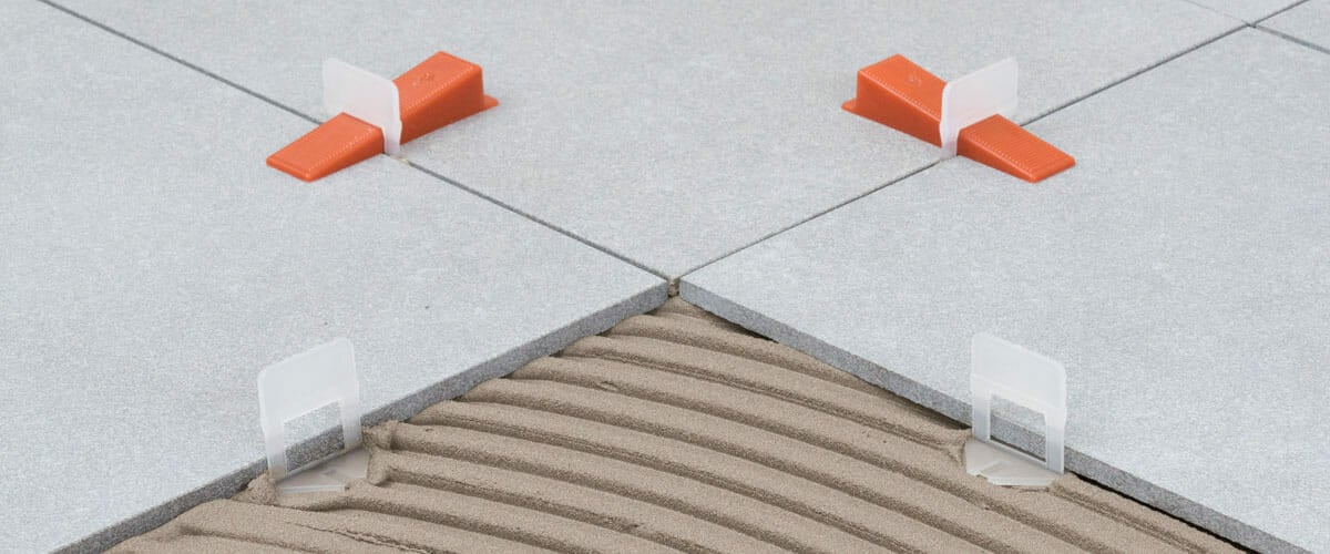 What is the minimum grout lines between tiles