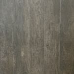 Wood-look porcelain tile Grove Shadow is a porcelain tile with a dark hardwood floor effect. Made in Spain.