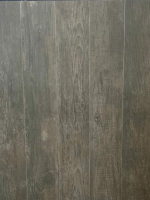 Wood look porcelain tile grove shadow is a porcelain tile with dark hardwood floor effect. Made in Spain.
