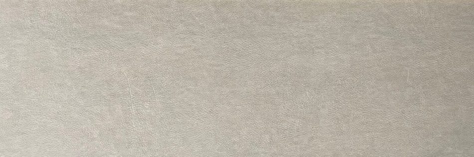 beige wall tile with the close-up texture of real leather