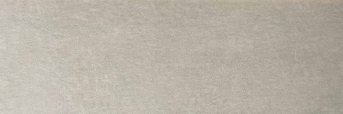 beige wall tile with the close-up texture of real leather