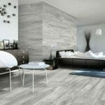 Bellver grey is a ceramic tile that looks like wood in light grey color