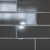 dark grey color glossy subway tile in large size
