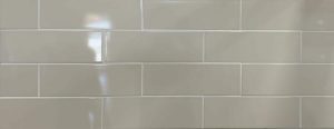 Light beige color subway tile with glossy finish in 4x12 size
