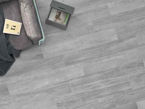 palio grey is a wood look porcelain tile adding concrete elements to the wood style
