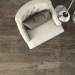 Porcelain floor tile with reclaimed wood look in walnut color
