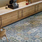 decorative blue tile in Moroccan Style with floral design in geometric shape.