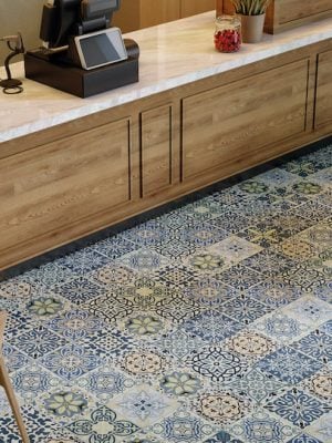 decorative blue tile in Moroccan Style with floral design in geometric shape.