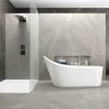 48×48 Altamura Silver matte porcelain tile in a modern grey limestone bathroom, installed on floor and walls with minimal grout lines.