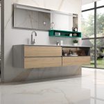 bathroom and bedroom scene with a withe marble tile that has beige veining