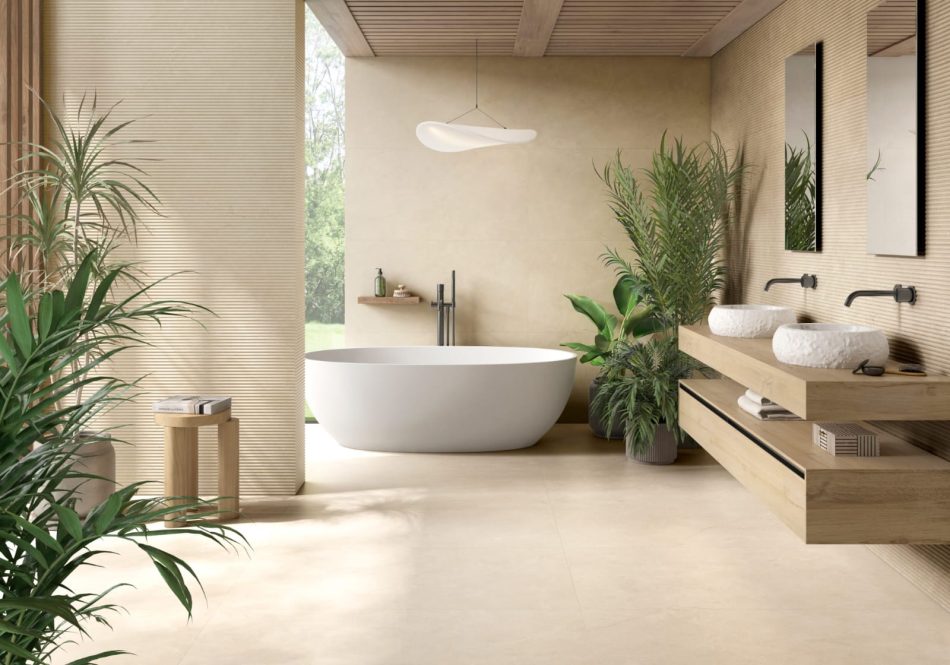 Crema Marfil stone-effect tile with satin finish in a bathroom