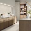 Castillo White 24x48 white concrete look porcelain tile in modern kitchen