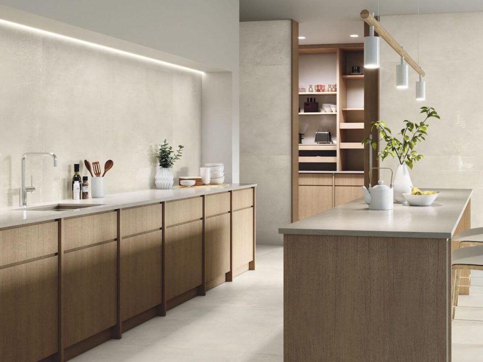 Castillo White 24x48 white concrete look porcelain tile in modern kitchen