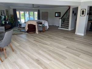 open floors with light color wood look tile