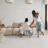 Limestone look large format porcelain tile in a serene room