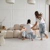 Large-format premium Turkish porcelain tile that looks like limestone in a serene family room