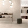 Tune Ivory light beige Stone Look porcelain tile in a modern interior space