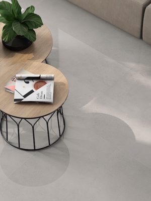 living room with concrete look tile in medium grey coor