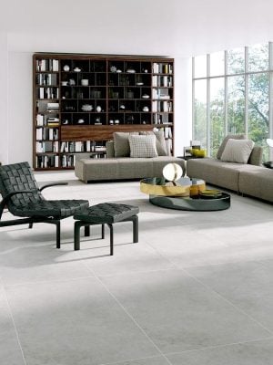a living room with gray color concrete look tile in rectangular shape