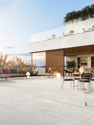 outside patio with 48x48 tile floor in light tones