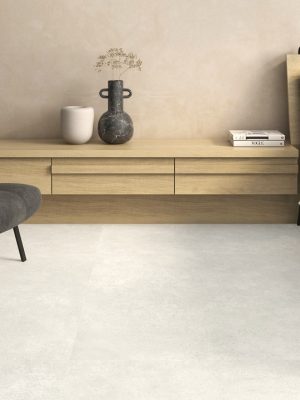 bedroom floor with a concrete look porcelain tile in light color and warm tone