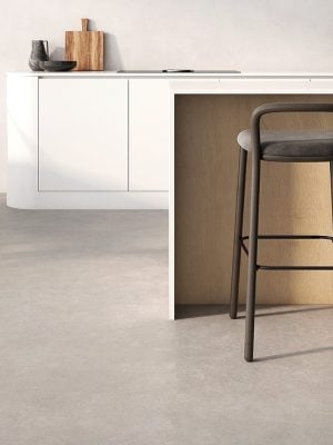 kitchen floor with a concrete look porcelain tile in light color and warm tone
