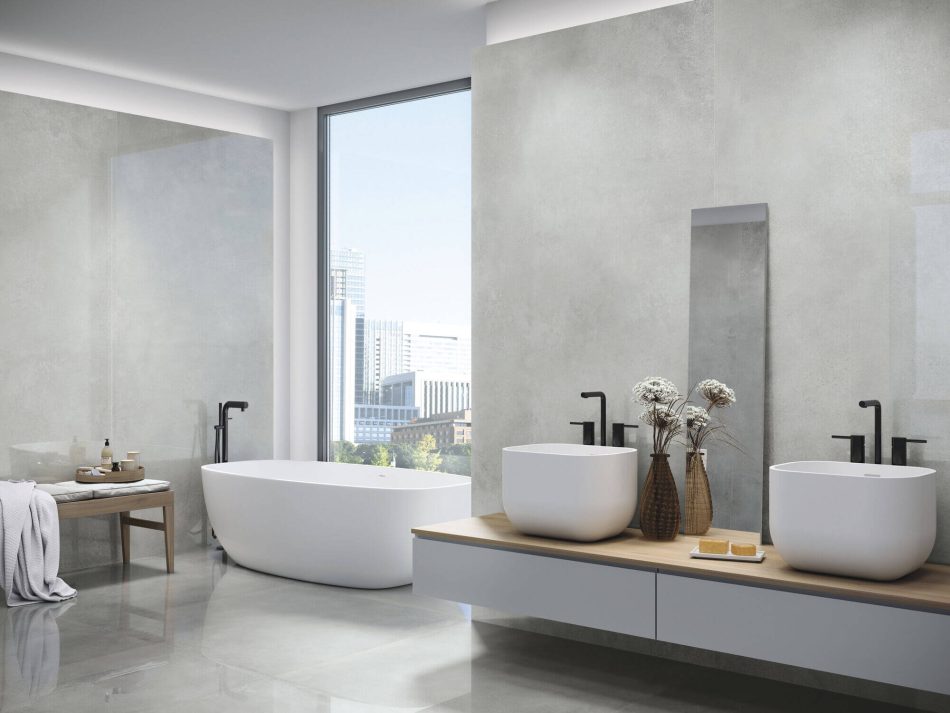 large format polished concrete look tile in a modern bathroom as wall and floor tile
