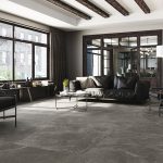 living room with a dark gray floor tile in 48x48 size