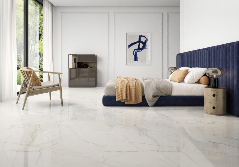 bedroom picture with matte finish white tile that has gold and bluish veining.