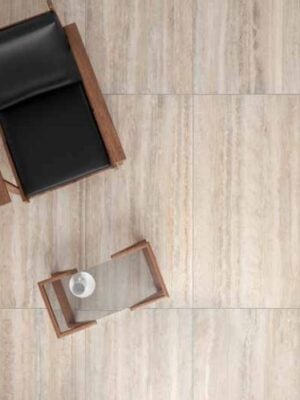 a living room floor with a vein cut travertine style porcelain tile in beige