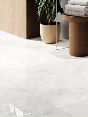 close up picture of floor with a light color 48x48 porcelain tile that looks subtle