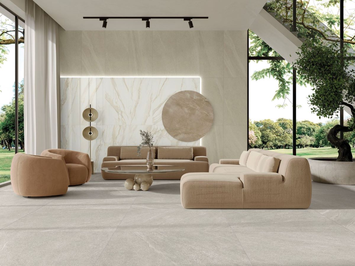 living room picture with a beige color porcelain tile that looks limestone. Subtle style but not industrial