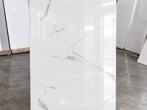 Polished white porcelain tile that look like Statuario marble. Budget options.
