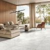 a living room picture with a 48x48 porcelain tile that a natural stone look and soft feel to it