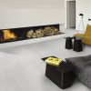 a living room scene with a light gray color 48x48 concrete style tile