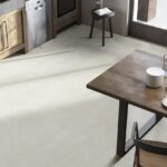 a room scene with a 48x48 concrete style tile in light beige color