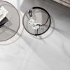 a living room floor with a white onyx porcelain tile that has cloudy movements