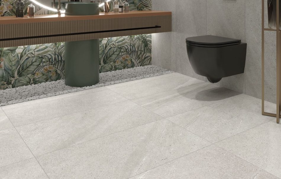 A modern bathroon floor with 24x48 Limestone White tile floor
