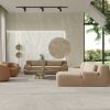A modern interior with Limestone white 48x48 tile floor and 24x48 Limestone Beige Wall