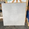 48x48 Urban Grey Tile standing in the warehouse