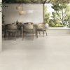 Minimalist Organic design with 48x48 Uptown Ivory Polished Wall, Matte Floor.