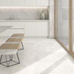 floors setting of the large format porcelain tile in light gray color with the look of the limestone