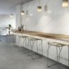High-End restaurant with 24x48 Blanco Ibiza polished tile used on the walls.