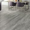 open concept kitchen with grey color wood looking tile