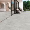 Indeed Silver 24x48 concrete look floor tile in a modern patio