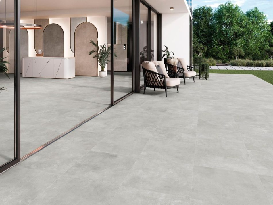Indeed Silver 24x48 concrete look floor tile in a modern patio