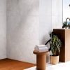 48x48 Sapphire White luxurious white polished porcelain floor creating a bright elegant modern interior