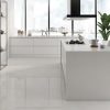 very light beige polished Tile Stella in a modern kitchen and living room area