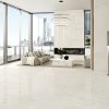 luxurious condo with light color marble look tile floor