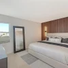 48x48 Uptown-ivory-ocean-Condo-Bedroom